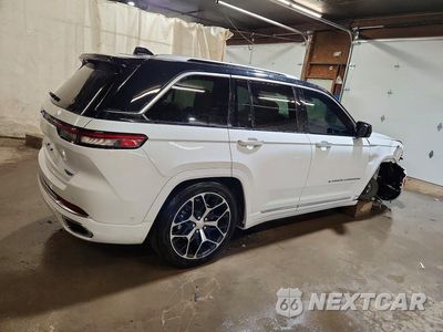 Trzecie zdjęcie samochodu z tyłu: 2022 JEEP GRAND CHEROKEE SUMMIT 4XE VIN:1C4RJYE65N8530344 - miniatura