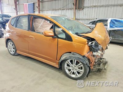 Czwarte zdjęcie samochodu z boku: 2010 HONDA FIT SPORT VIN:JHMGE8H42AS006652 - miniatura