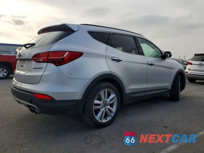 Trzecie zdjęcie samochodu z tyłu: 2014 HYUNDAI SANTA FE SPORT 2.0T VIN:5XYZW3LA6EG156606 - miniatura