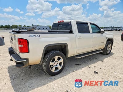 Trzecie zdjęcie samochodu z tyłu: 2015 GMC SIERRA K1500 SLE VIN:3GTU2UEC4FG181422 - miniatura