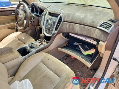 Zdjęcie 8 z 12 samochodu: 2003 CADILLAC SRX VIN:3GYFNKE40AS644489 - miniatura