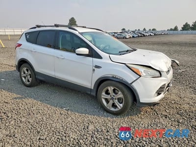 Czwarte zdjęcie samochodu z boku: 2014 FORD ESCAPE SE VIN:1FMCU9GX1EUE41592 - miniatura