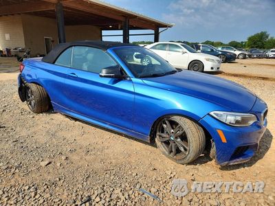 Czwarte zdjęcie samochodu z boku: 2016 BMW M235I VIN:WBA1M1C51GV394138 - miniatura