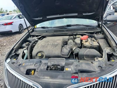 Zdjęcie 11 z 12 samochodu: 2013 LINCOLN MKS VIN:1LNHL9DKXDG602312 - miniatura