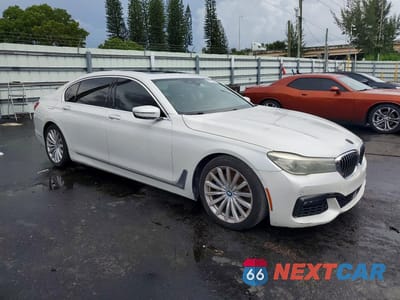 Czwarte zdjęcie samochodu z boku: 2016 BMW 740 I VIN:WBA7E2C51GG547862 - miniatura