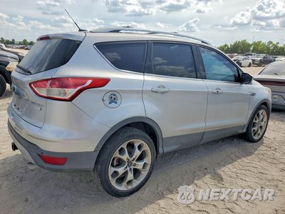 Trzecie zdjęcie samochodu z tyłu: 2014 FORD ESCAPE TITANIUM VIN:1FMCU0J93EUA38994 - miniatura