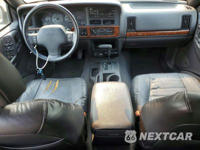 Zdjęcie 8 z 13 samochodu: 1998 JEEP GRAND CHEROKEE LAREDO VIN:1J4FX48S3WC236243 - miniatura