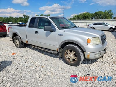 Czwarte zdjęcie samochodu z boku: 2005 FORD F150 VIN:1FTPX14555NA70867 - miniatura