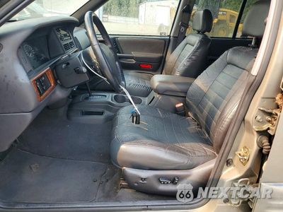 Zdjęcie 7 z 13 samochodu: 1998 JEEP GRAND CHEROKEE LAREDO VIN:1J4FX48S3WC236243 - miniatura