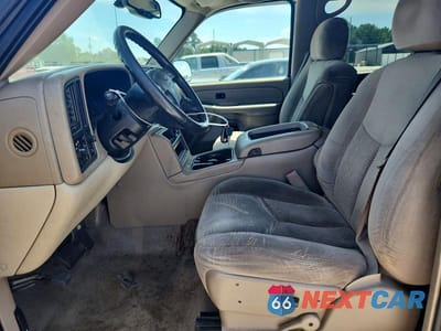 Zdjęcie 7 z 13 samochodu: 2004 CHEVROLET SUBURBAN C1500 VIN:1GNEC16Z74J313207 - miniatura