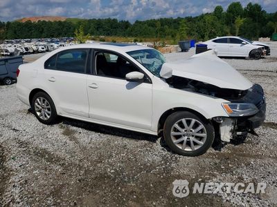 Czwarte zdjęcie samochodu z boku: 2012 VOLKSWAGEN JETTA SE VIN:3VWDP7AJ3CM407080 - miniatura