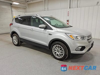 Czwarte zdjęcie samochodu z boku: 2019 FORD ESCAPE TITANIUM VIN:1FMCU0J97KUA35754 - miniatura