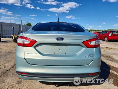 Zdjęcie 6 z 12 samochodu: 2013 FORD FUSION SE HYBRID VIN:3FA6P0LU4DR260787 - miniatura