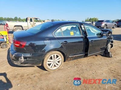 Trzecie zdjęcie samochodu z tyłu: 2017 VOLKSWAGEN JETTA SEL VIN:3VWL17AJ6HM214393 - miniatura