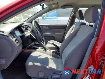 Zdjęcie 7 z 13 samochodu: 2004 MITSUBISHI LANCER ES VIN:JA3AJ26E14U010520 - miniatura