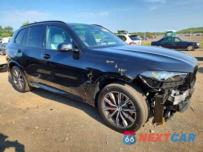Czwarte zdjęcie samochodu z boku: 2026 BMW X5 XDRIVE40I VIN:5UX23EU01T9477977 - miniatura