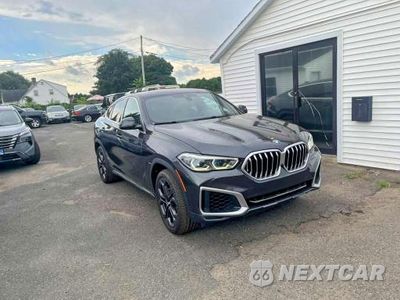 Czwarte zdjęcie samochodu z boku: 2023 BMW X6 XDRIVE40I VIN:5UXCY6C01P9N50333 - miniatura
