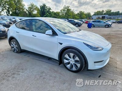 Czwarte zdjęcie samochodu z boku: 2023 TESLA MODEL Y VIN:7SAYGDEEXPA082812 - miniatura