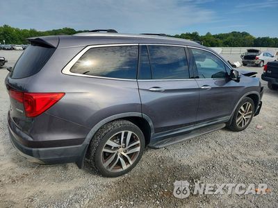 Trzecie zdjęcie samochodu z tyłu: 2017 HONDA PILOT TOURING VIN:5FNYF5H92HB008387 - miniatura
