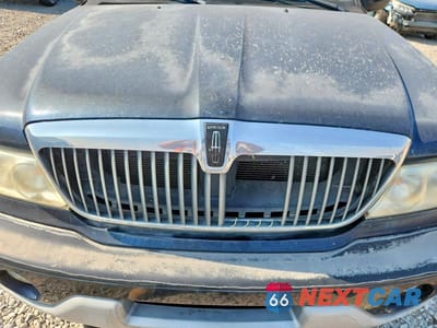 Zdjęcie 12 z 13 samochodu: 2001 LINCOLN NAVIGATOR VIN:5LMFU28R91LJ30932 - miniatura