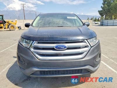 Piąte zdjęcie samochodu w środku: 2017 FORD EDGE SE VIN:2FMPK3G93HBB17043 - miniatura
