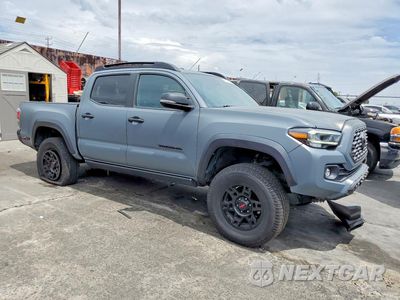 Czwarte zdjęcie samochodu z boku: 2021 TOYOTA TACOMA TRD OFF-ROAD VIN:3TMCZ5AN6MM387859 - miniatura