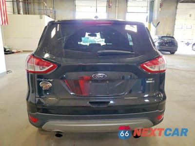 Zdjęcie 6 z 12 samochodu: 2016 FORD ESCAPE SE VIN:1FMCU9GX4GUC80013 - miniatura