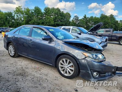 Czwarte zdjęcie samochodu z boku: 2012 TOYOTA CAMRY HYBRID XLE VIN:4T1BD1FK1CU031097 - miniatura