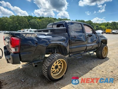 Trzecie zdjęcie samochodu z tyłu: 2023 TOYOTA TACOMA SR V6 VIN:3TMCZ5AN3PM642438 - miniatura