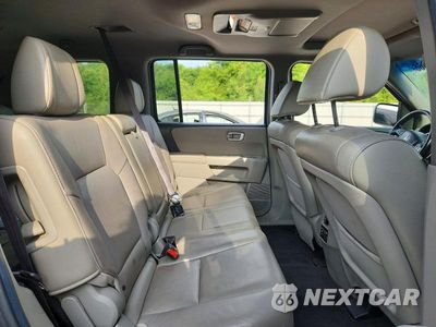 Zdjęcie 11 z 14 samochodu: 2012 HONDA PILOT EXL VIN:5FNYF4H6XCB014964 - miniatura