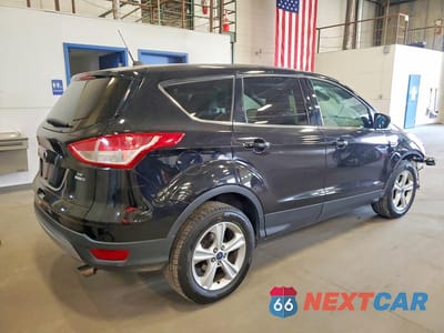 Trzecie zdjęcie samochodu z tyłu: 2016 FORD ESCAPE SE VIN:1FMCU9GX4GUC80013 - miniatura
