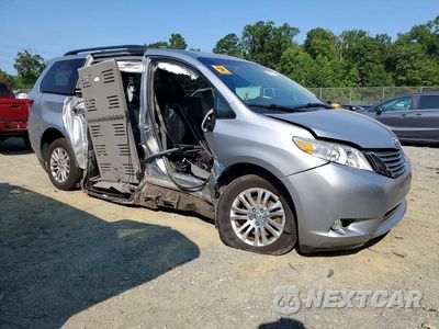 Czwarte zdjęcie samochodu z boku: 2016 TOYOTA SIENNA XLE 8-PASSENGER VIN:5TDYK3DC9GS713568 - miniatura
