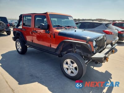 Czwarte zdjęcie samochodu z boku: 2009 JEEP WRANGLER UNLIMITED RUBICON VIN:1J4GA69199L769399 - miniatura