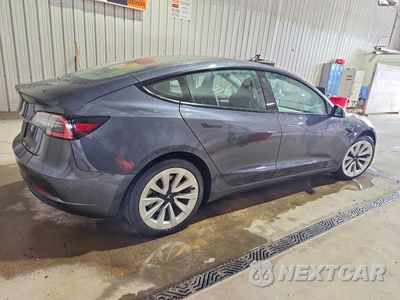 Trzecie zdjęcie samochodu z tyłu: 2021 TESLA MODEL 3 VIN:5YJ3E1EA4MF062272 - miniatura