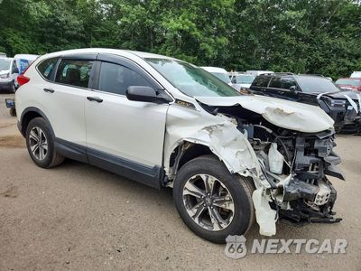 Czwarte zdjęcie samochodu z boku: 2017 HONDA CR-V LX VIN:5J6RW6H32HL003462 - miniatura