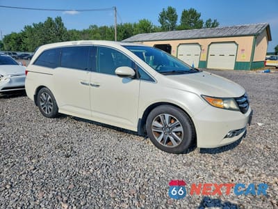 Czwarte zdjęcie samochodu z boku: 2014 HONDA ODYSSEY TOURING VIN:5FNRL5H98EB023419 - miniatura