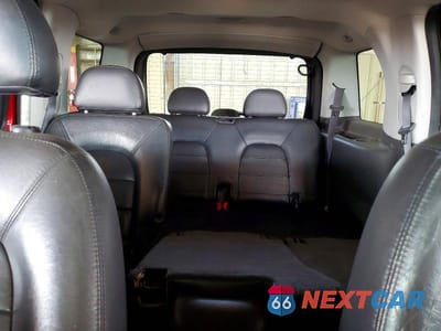 Zdjęcie 10 z 13 samochodu: 2004 FORD EXPLORER LIMITED VIN:1FMDU75W74UB08802 - miniatura