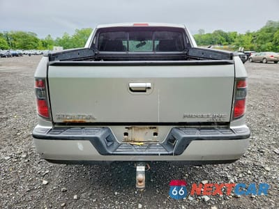 Zdjęcie 6 z 12 samochodu: 2014 HONDA RIDGELINE SPORT VIN:5FPYK1F75EB004097 - miniatura