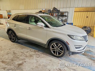 Czwarte zdjęcie samochodu z boku: 2015 LINCOLN MKC VIN:5LMTJ2AH1FUJ20376 - miniatura
