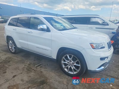 Czwarte zdjęcie samochodu z boku: 2016 JEEP GRAND CHEROKEE SUMMIT VIN:1C4RJFJG3GC490591 - miniatura