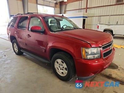 Czwarte zdjęcie samochodu z boku: 2014 CHEVROLET TAHOE K1500 LT VIN:1GNSKBE02ER196878 - miniatura