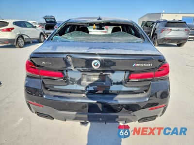 Zdjęcie 6 z 13 samochodu: 2023 BMW M550XI VIN:WBA13BK00PCM19766 - miniatura