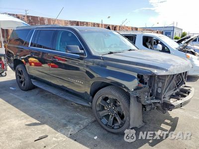 Czwarte zdjęcie samochodu z boku: 2017 CHEVROLET SUBURBAN C1500 LT VIN:1GNSCHKC8HR184611 - miniatura