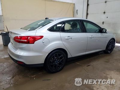 Trzecie zdjęcie samochodu z tyłu: 2016 FORD FOCUS SE VIN:1FADP3F27GL238854 - miniatura
