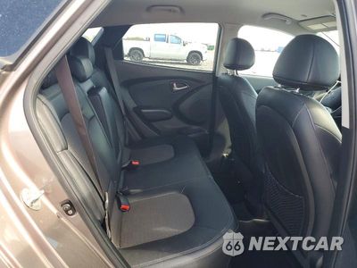 Zdjęcie 10 z 13 samochodu: 2011 HYUNDAI TUCSON GLS VIN:KM8JUCAC0BU226436 - miniatura