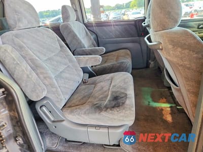 Zdjęcie 11 z 13 samochodu: 2004 HONDA ODYSSEY EX VIN:5FNRL18664B094275 - miniatura