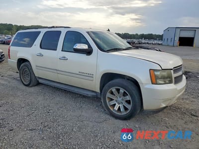 Czwarte zdjęcie samochodu z boku: 2010 CHEVROLET SUBURBAN C1500 LTZ VIN:1GNUCKE02AR134364 - miniatura