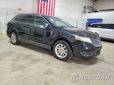 Czwarte zdjęcie samochodu z boku: 2014 LINCOLN MKT VIN:2LMHJ5NK6EBL56675 - miniatura