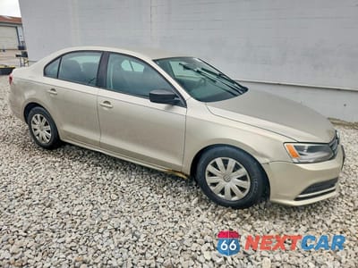 Czwarte zdjęcie samochodu z boku: 2016 VOLKSWAGEN JETTA S VIN:3VW267AJ2GM218310 - miniatura
