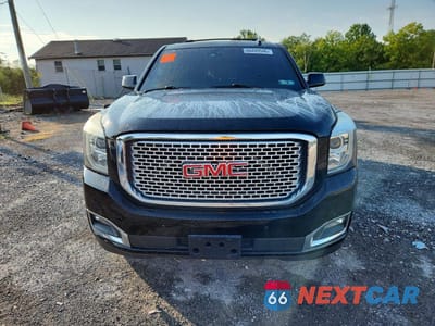 Piąte zdjęcie samochodu w środku: 2016 GMC YUKON DENALI VIN:1GKS2CKJXGR428940 - miniatura